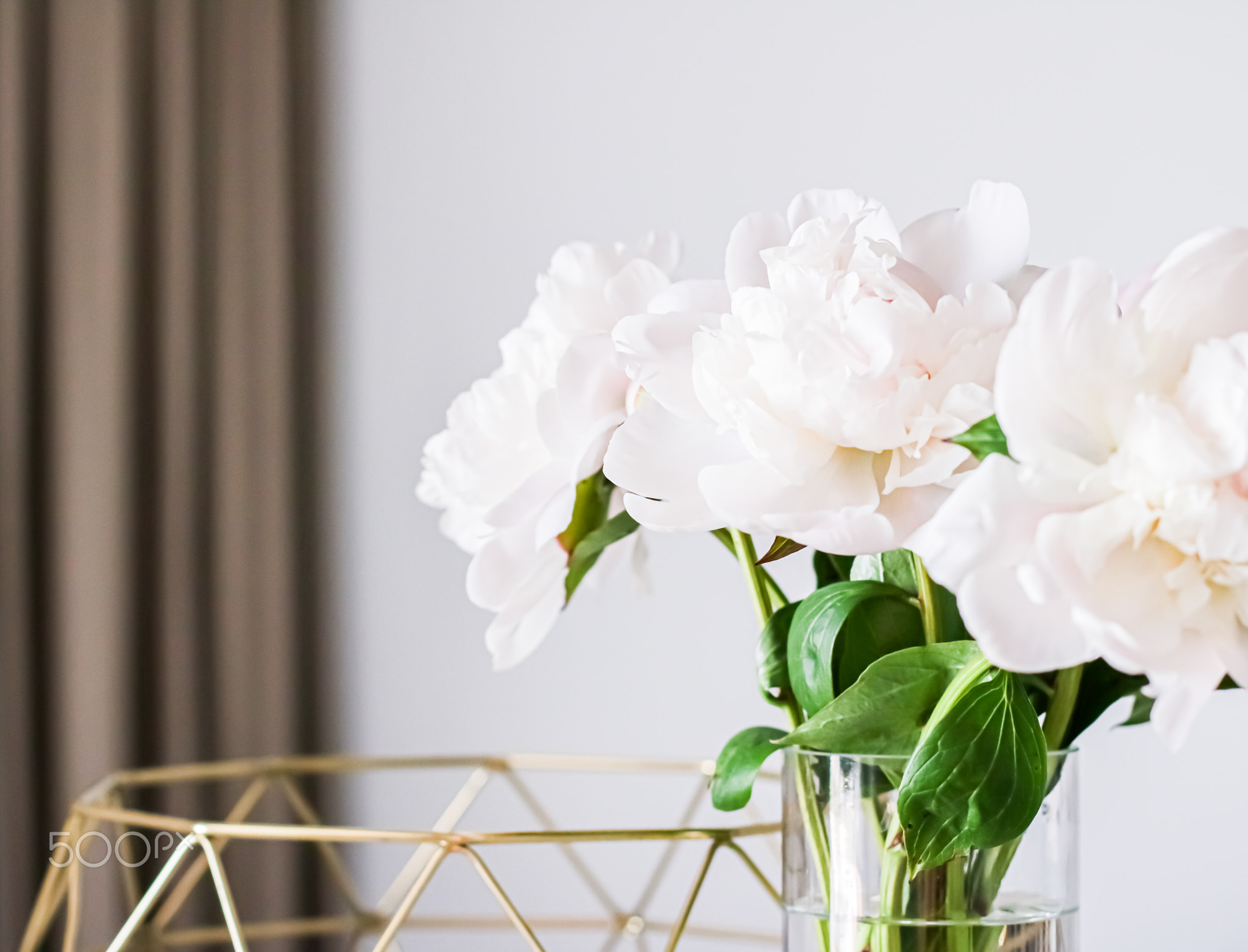 Chic bouquet of peony flowers in vase as home decor idea, luxury