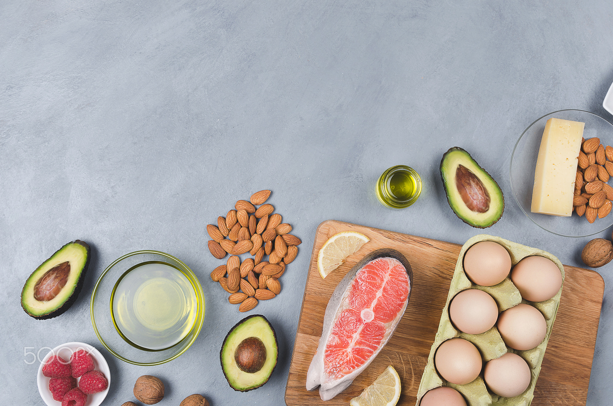 Keto diet, low carb healthy food on gray background