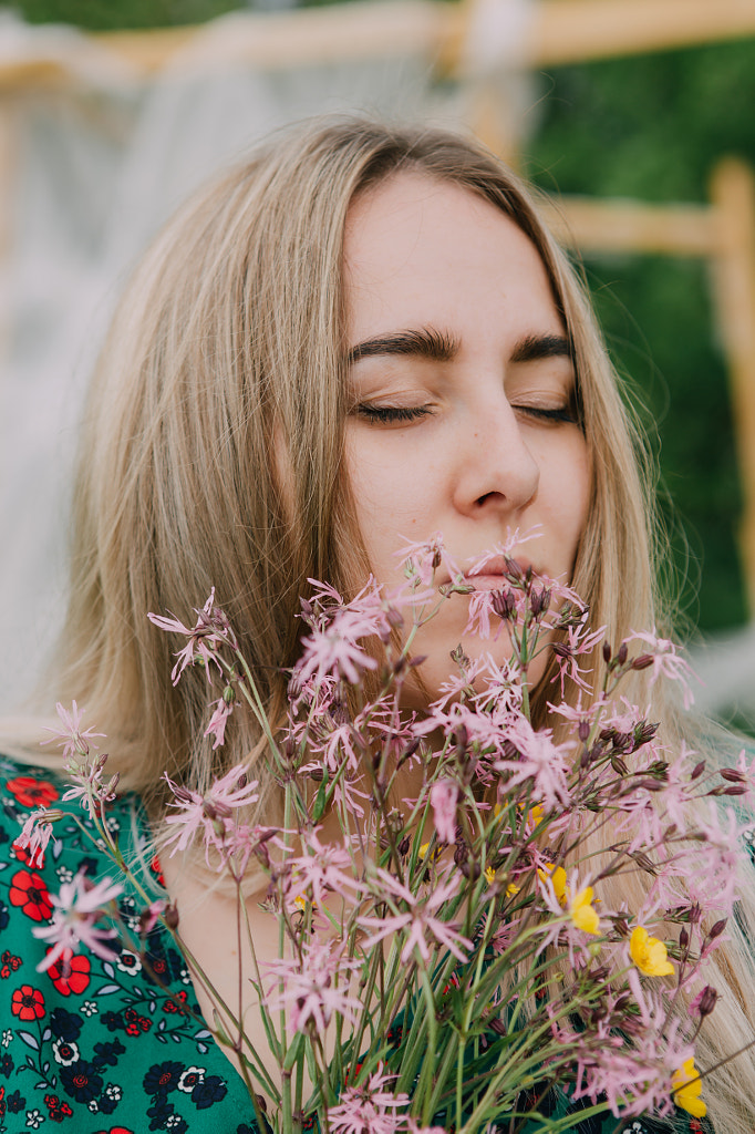 young girl with flowers on the field by Alena Sadreeva on 500px.com