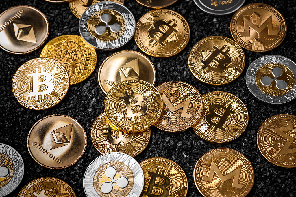 Stack of cryptocurrencies by Cseh Ioan on 500px.com