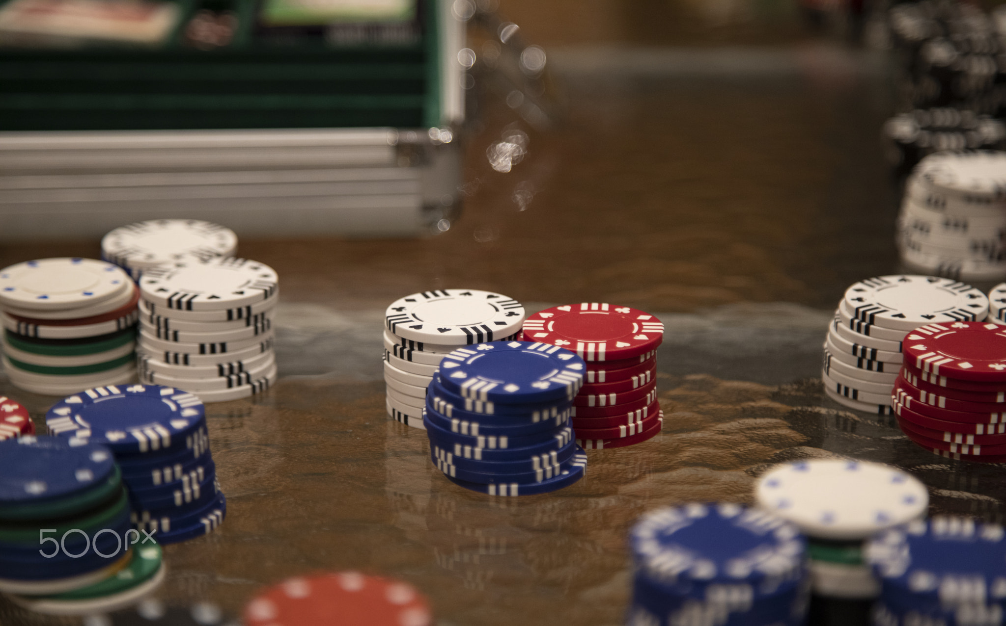 Poker game coins at card table