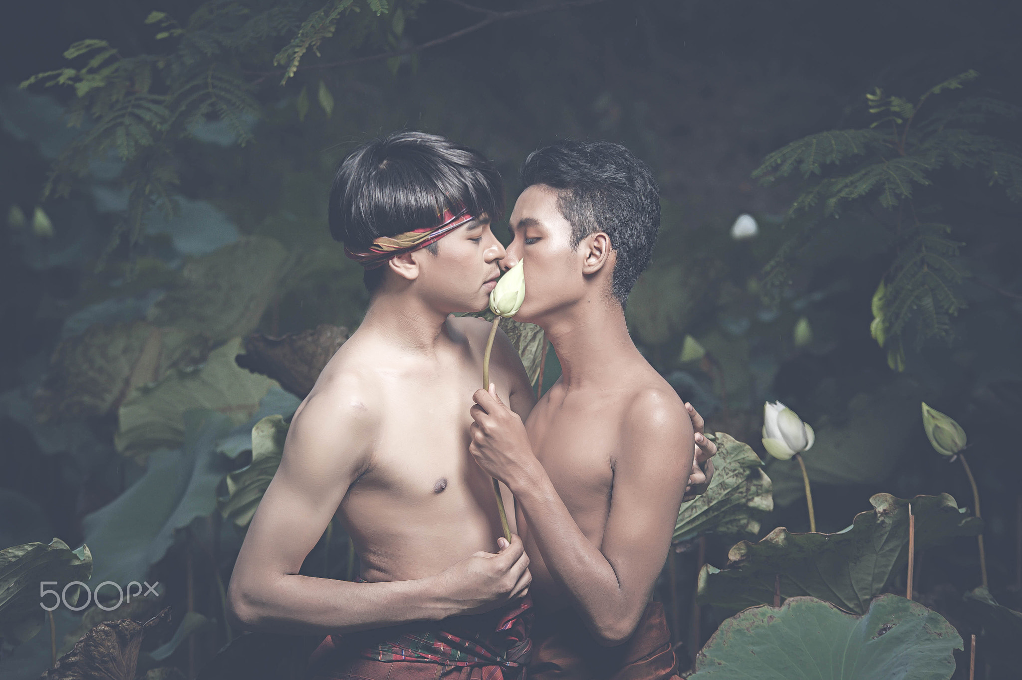 Two men love each other in beautiful Thai silk dresses. Not called gay