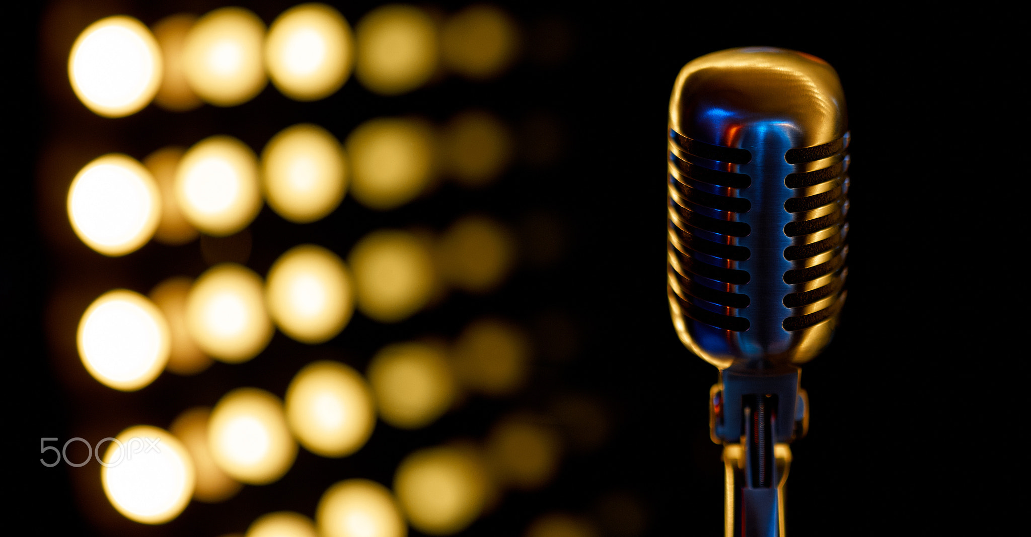 vintage microphone with color background in karaoke