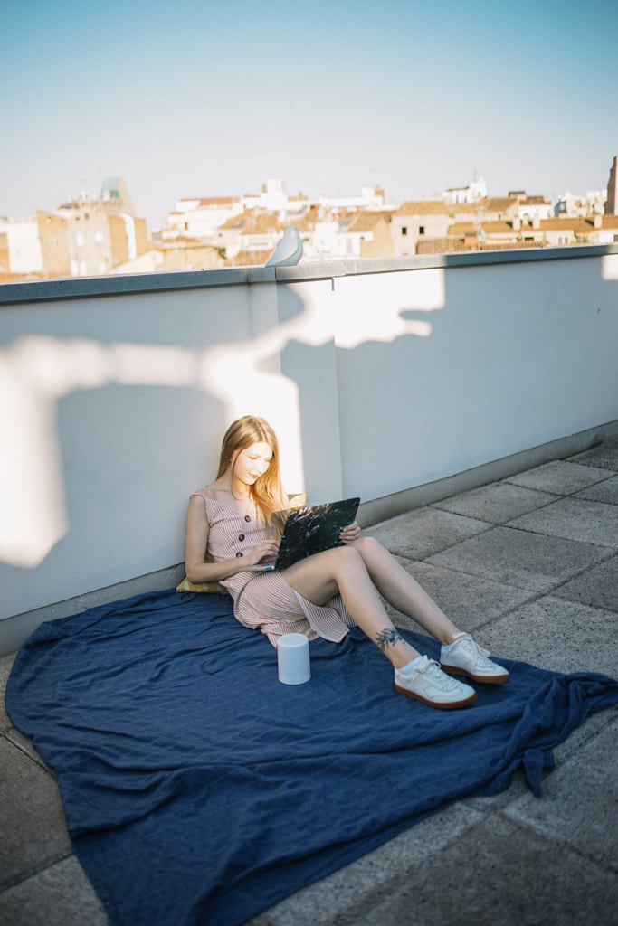 Working online from home on a laptop by All Nea on 500px.com