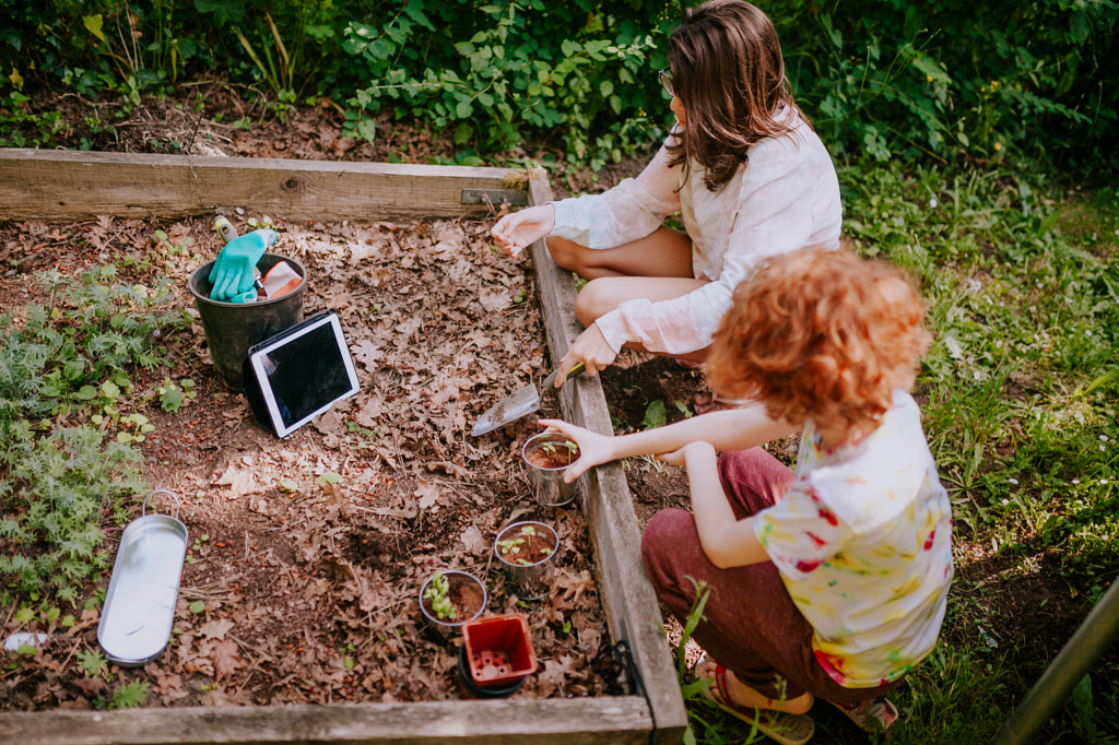Kids Gardening while watching video by Marcia Fernandes on 500px.com