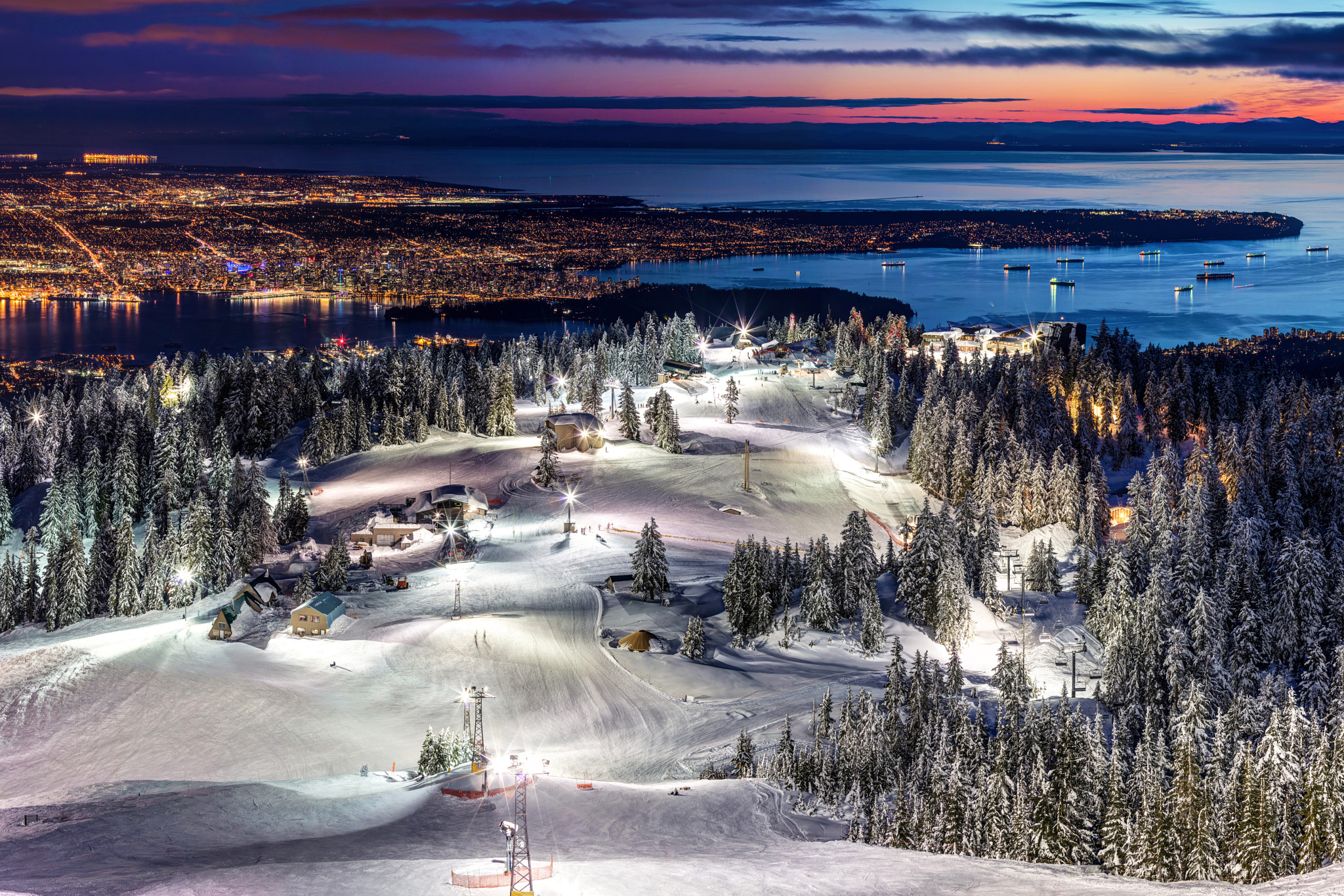Grouse Mountain Ski resort at Dusk with a view of Vancouver city by