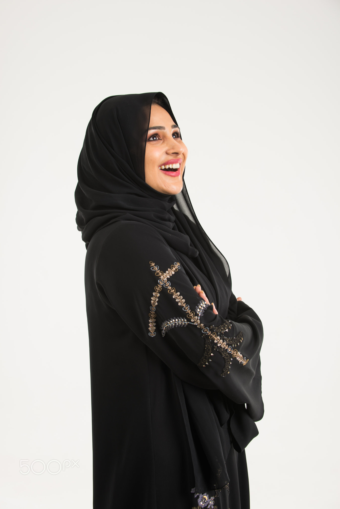 Arabic woman with abaya in studio
