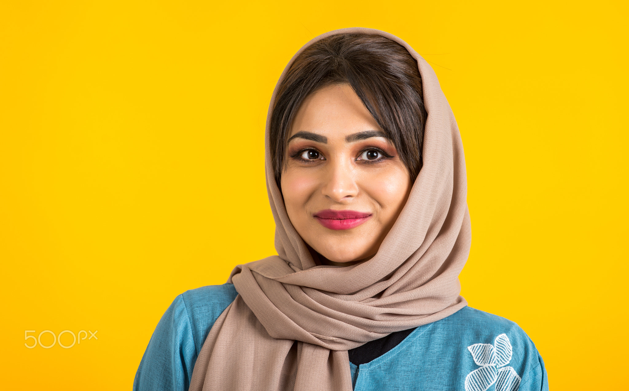 Arabic woman with abaya in studio