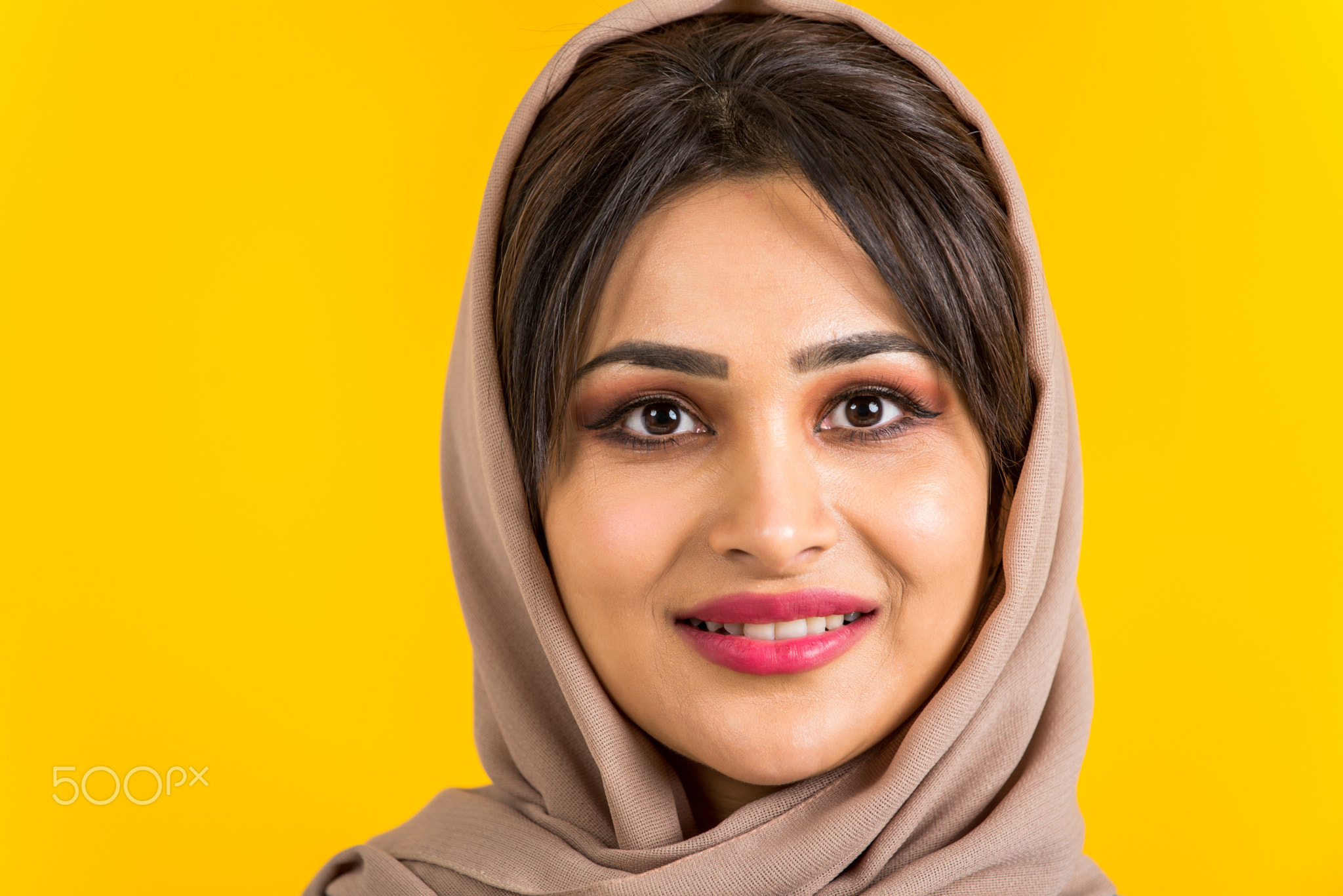 Arabic woman with abaya in studio