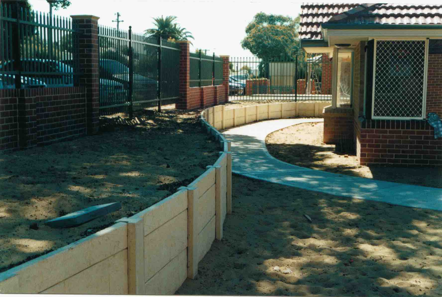 Panel and Post Retaining wall in Perth by \