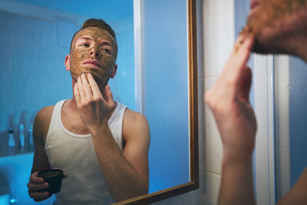 Man applying facial mask by Jaromír Chalabala on 500px.com