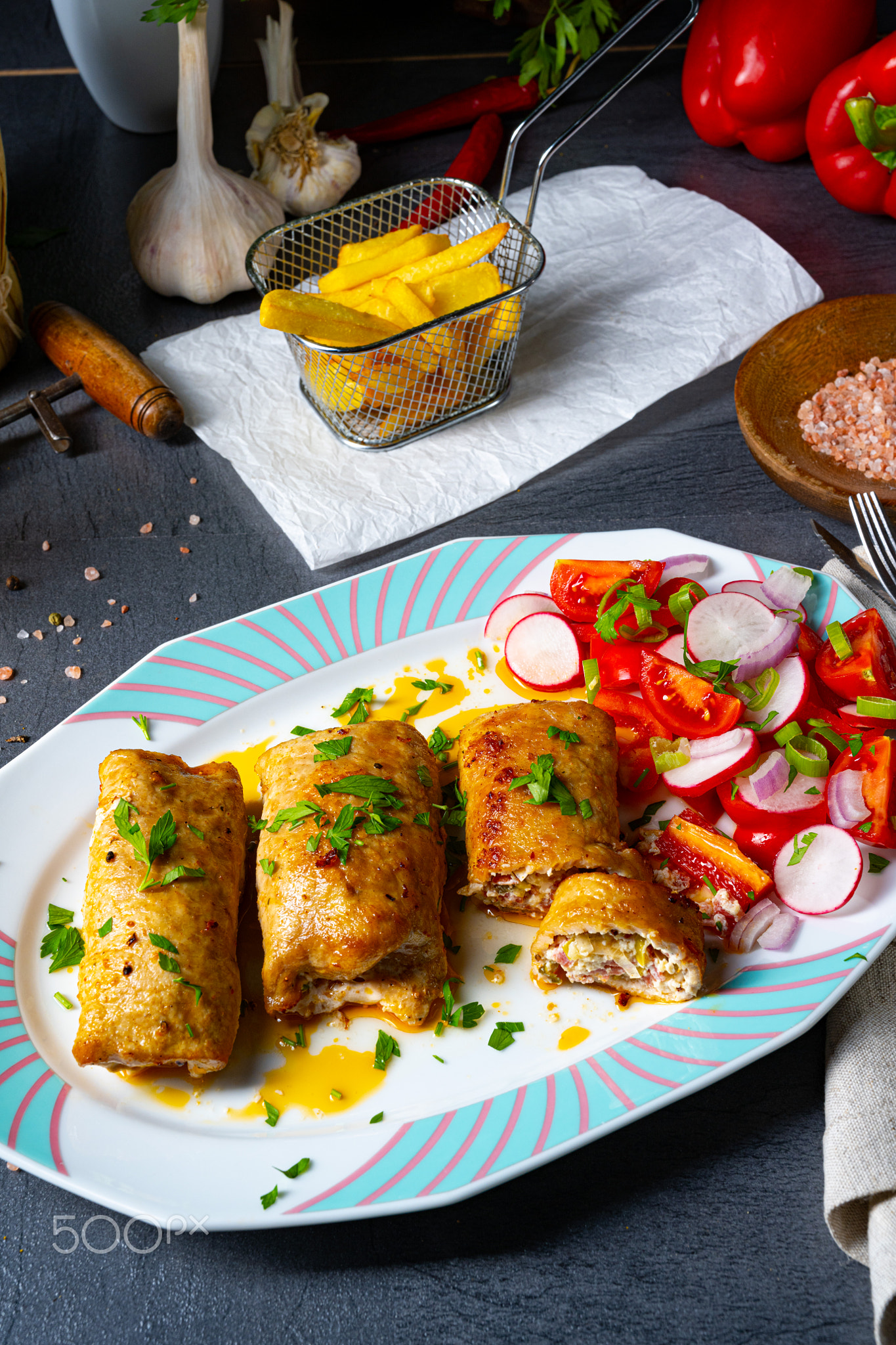 Vegetable roulade from roast  pork loins with salads