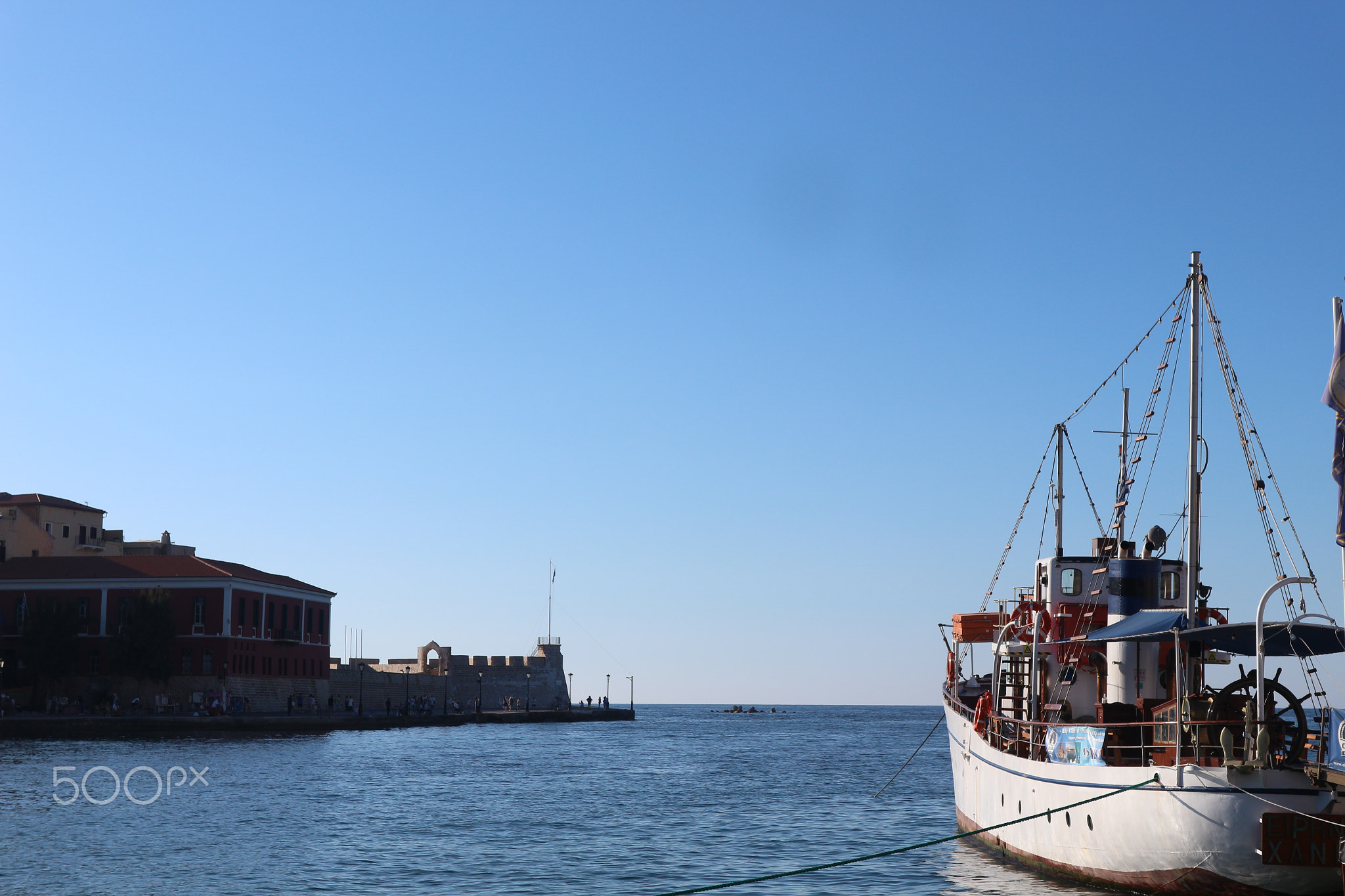 Greece Boat on Sea with Harbour Structure