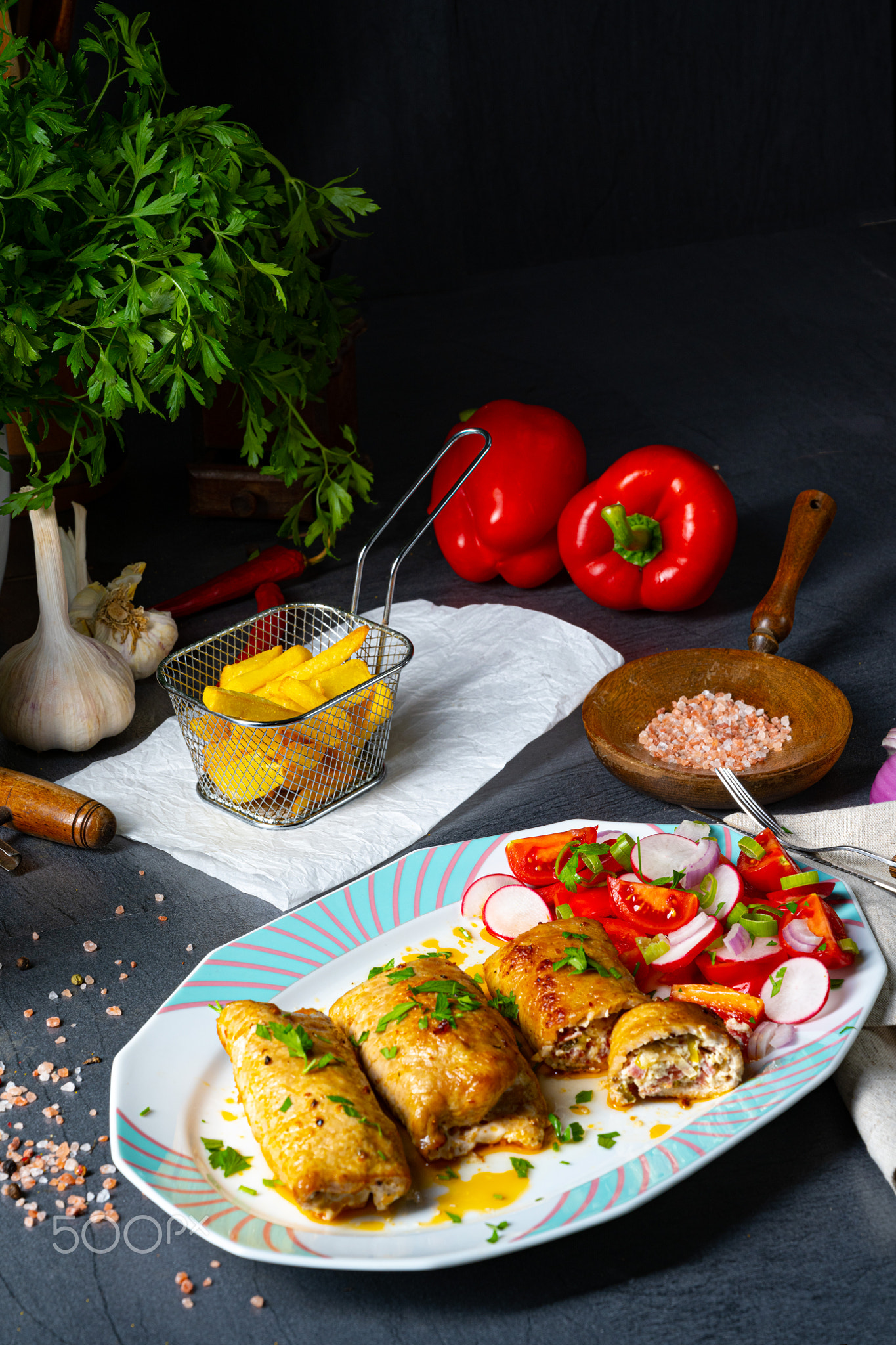 Vegetable roulade from roast  pork loins with salads