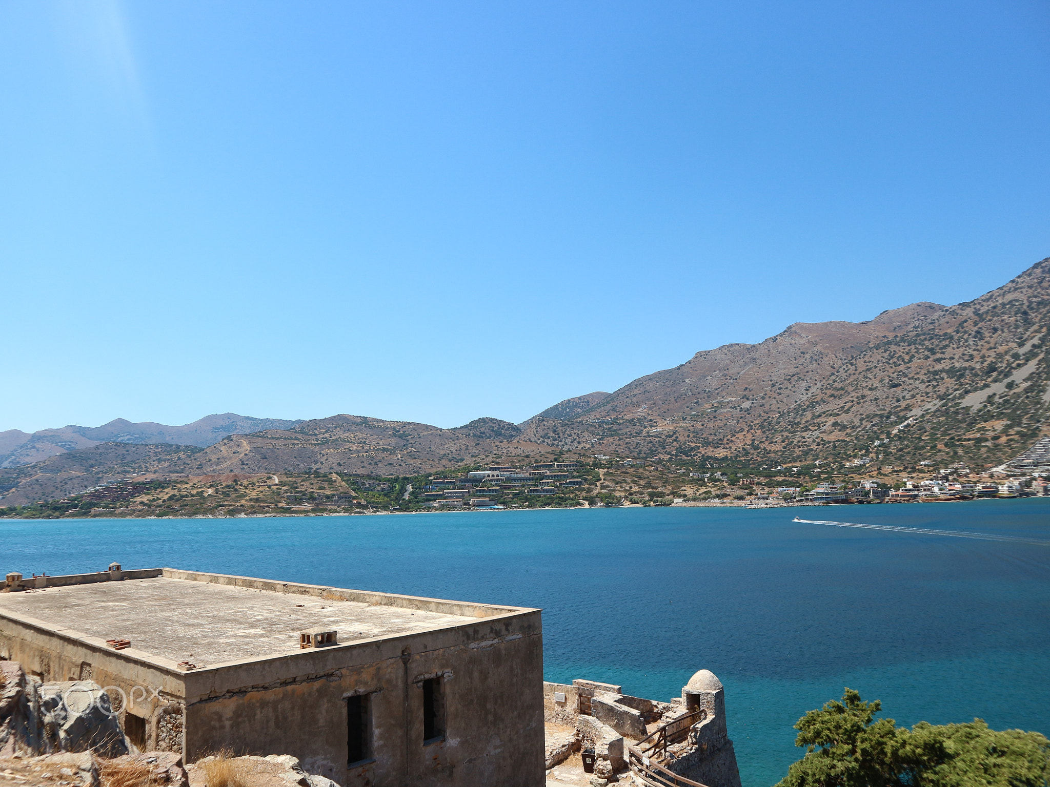 Spinalonga Island View of Ocean with Mountains and Jet Ski
