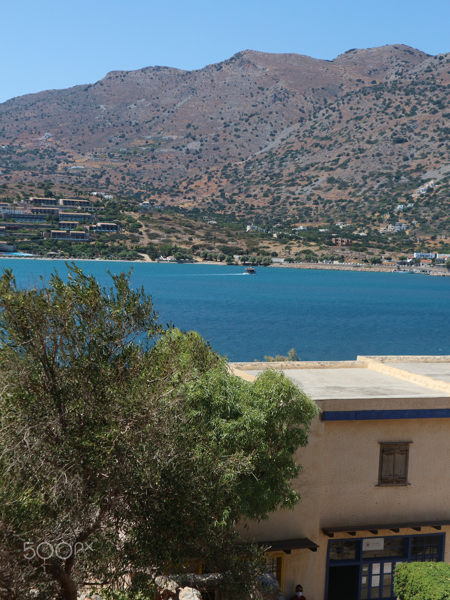 Building on Spinalonga Island with Sea and Mountain