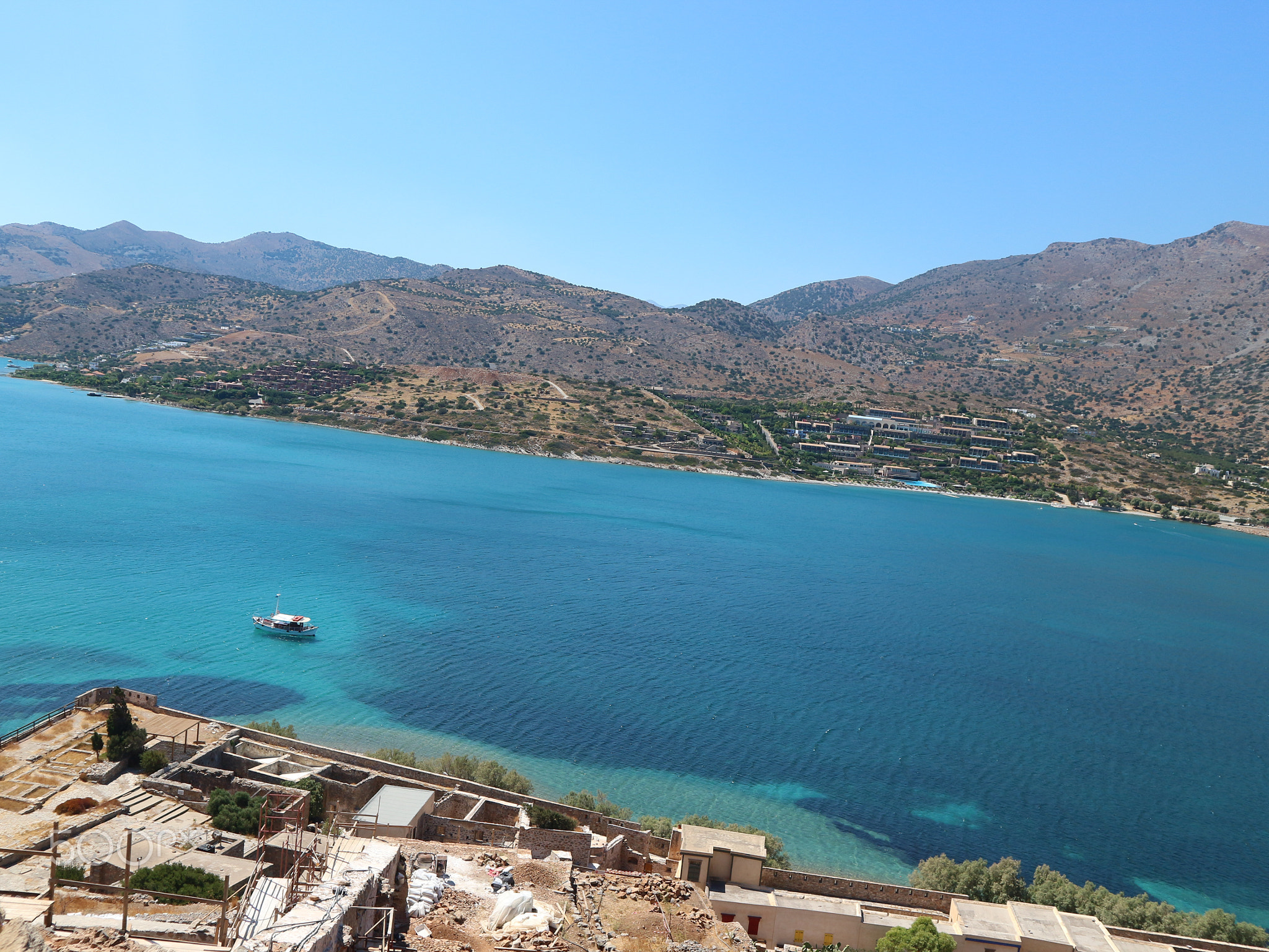 Ocean View from Spinalonga Island with Old Tower Walls and Blue Ocean