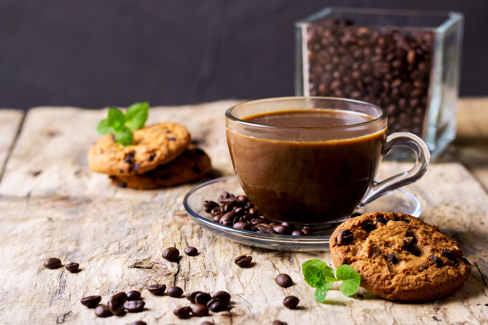 A plate of food and a cup of coffee