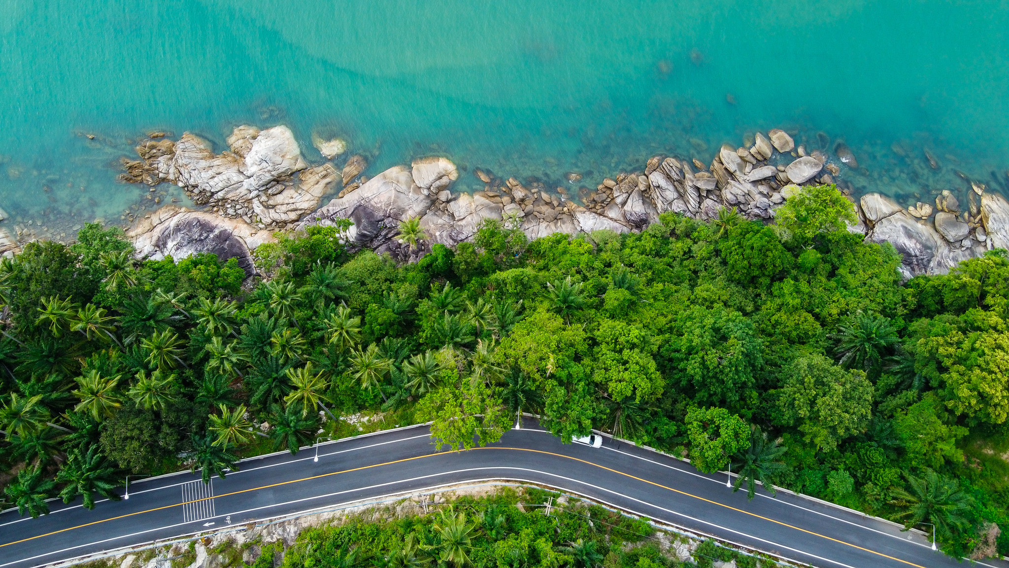 Aerial view of road and beach between Khanom and Sichon