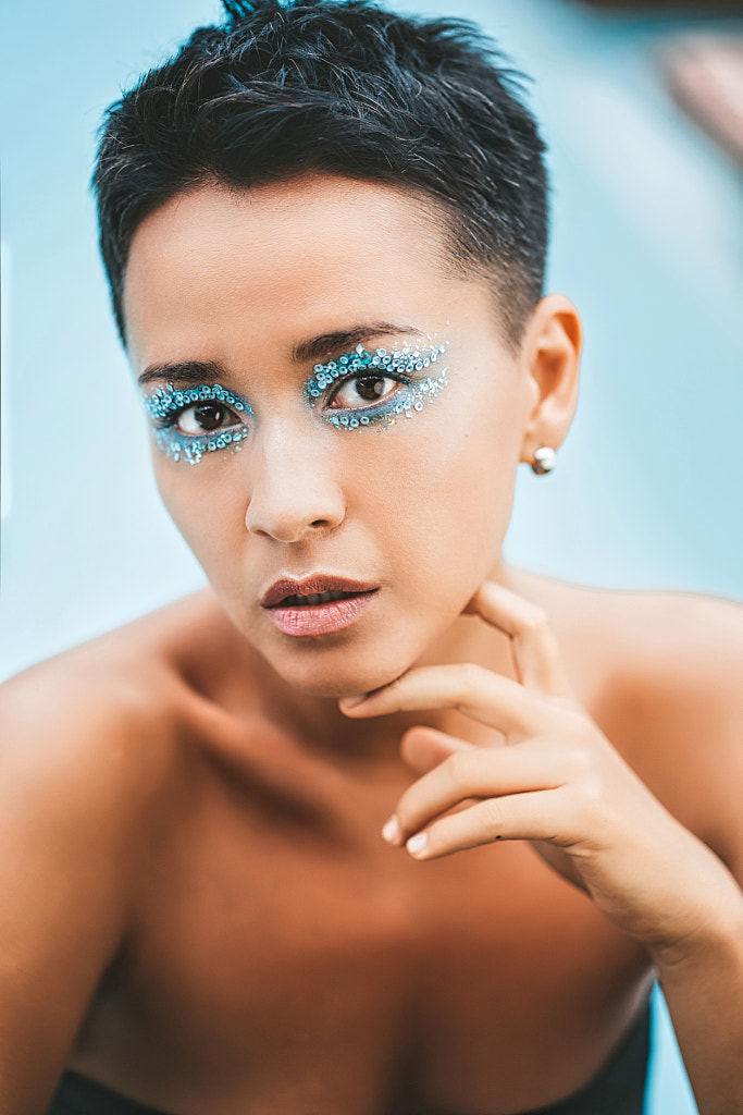 Portrait of young woman with blue rhinestones make-up by Natalie Zotova on 500px.com