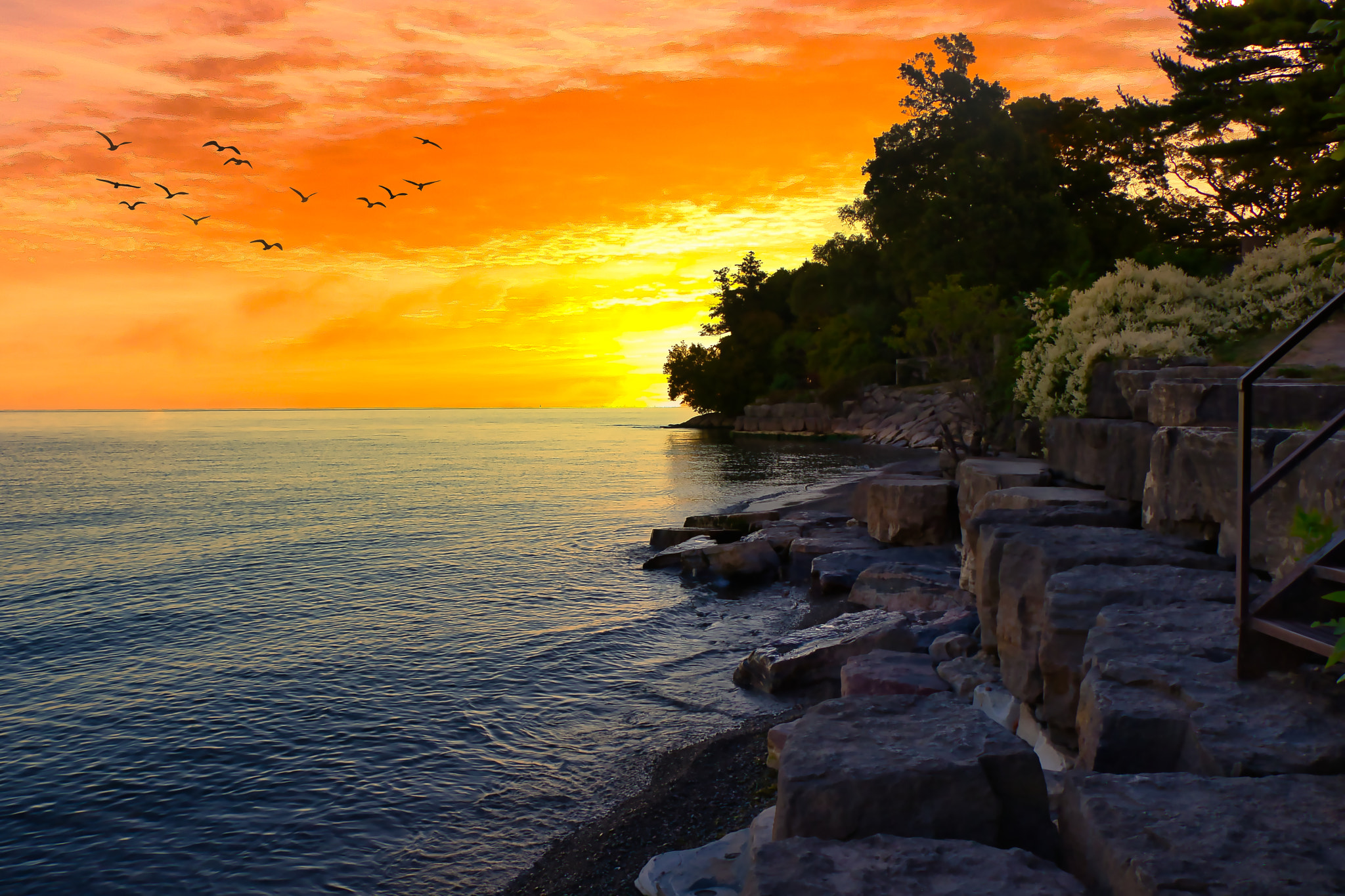 Sunrise on Lake Ontario by Marianne Clement / 500px