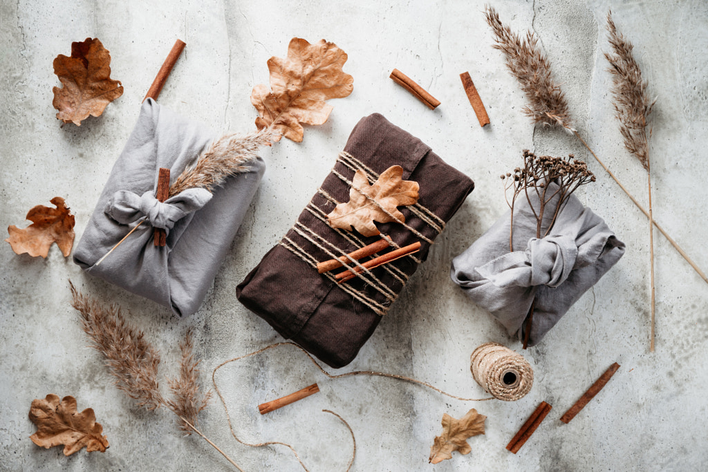 Top view of wrapped gifts by linen fabric in furoshiki eco style by Edalin Photography on 500px.com