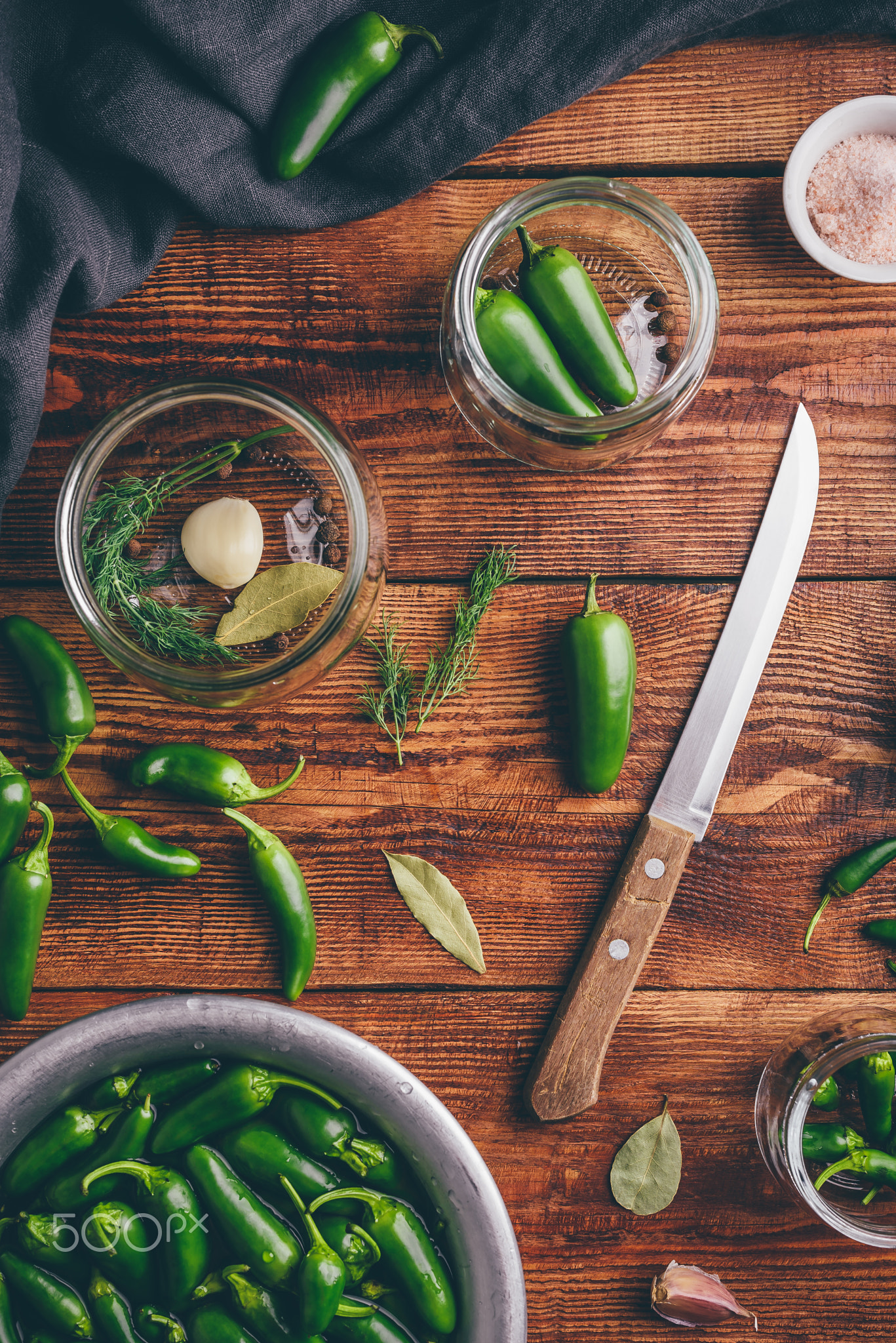 Canned Jalapeno Peppers, Garlic And Glass Jars\r