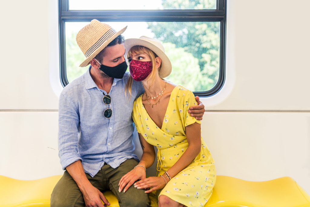 Couple travelling in the subway during covid-19 pandemic by Fabio Formaggio on 500px.com