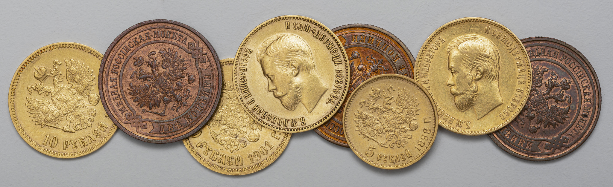 Numismatics. Old collectible coins made of silver, gold and copper