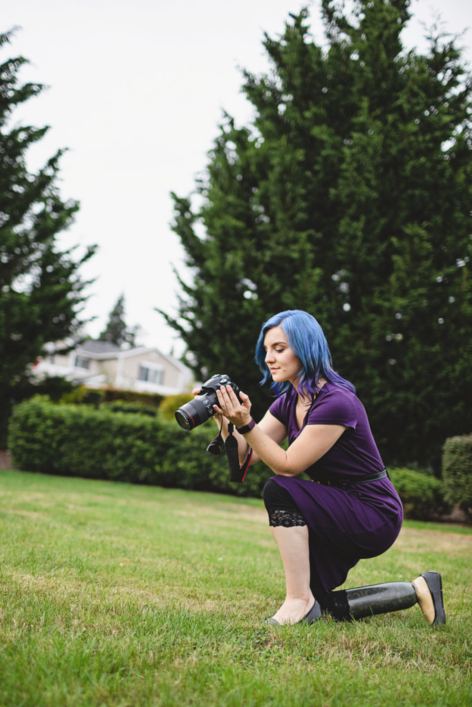 Female Amputee Photographer Checking Back of Camera, Poulsbo, WA, USA by Nadia Ramahi on 500px.com