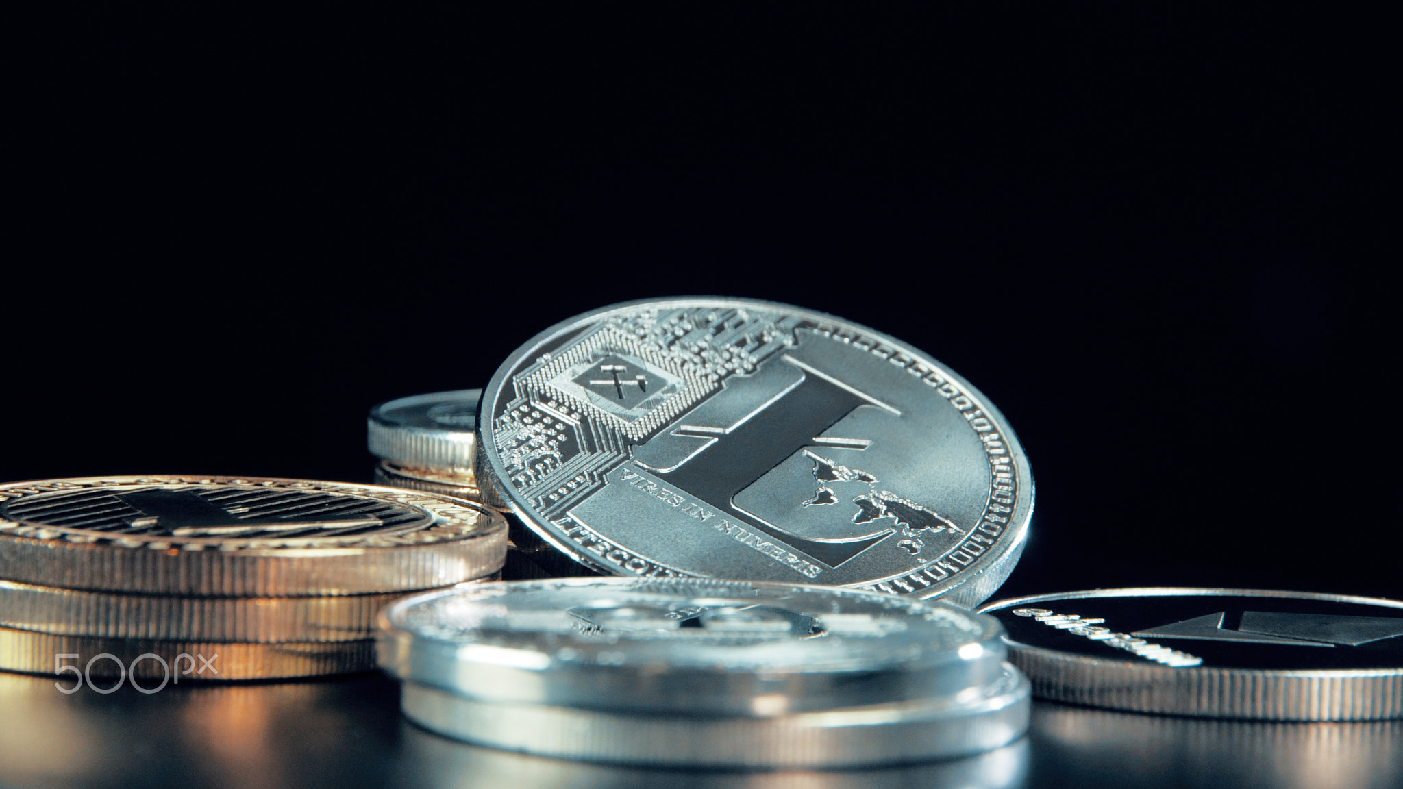 Silver Litecoin coin on black background. Silver Crypto coin on