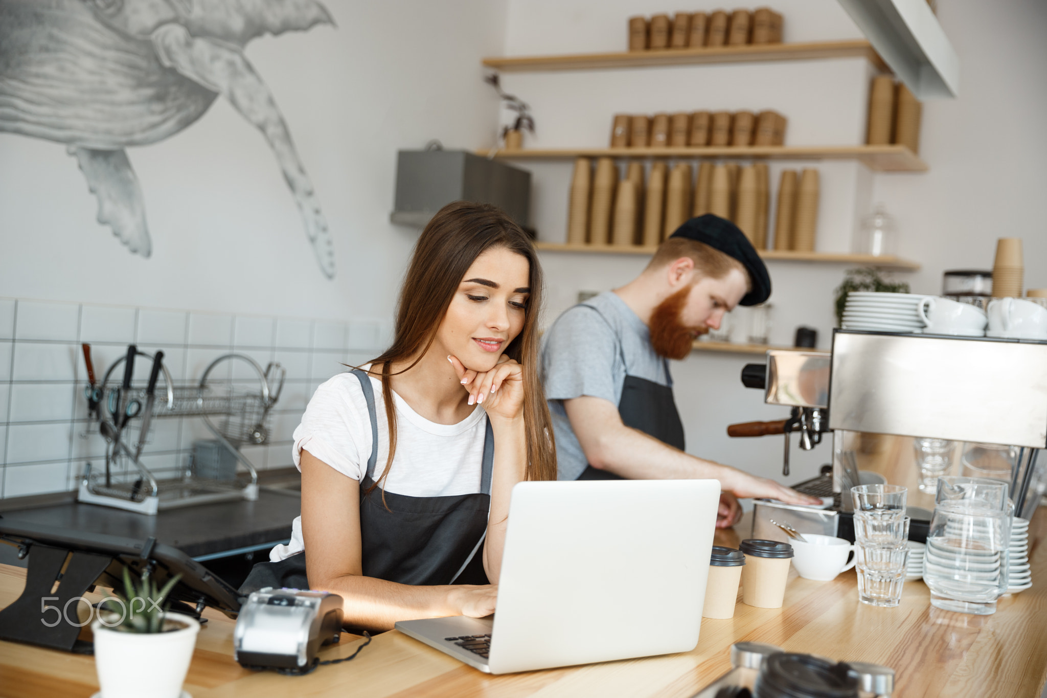 Coffee Business Concept - beautiful caucasian bartender barista or