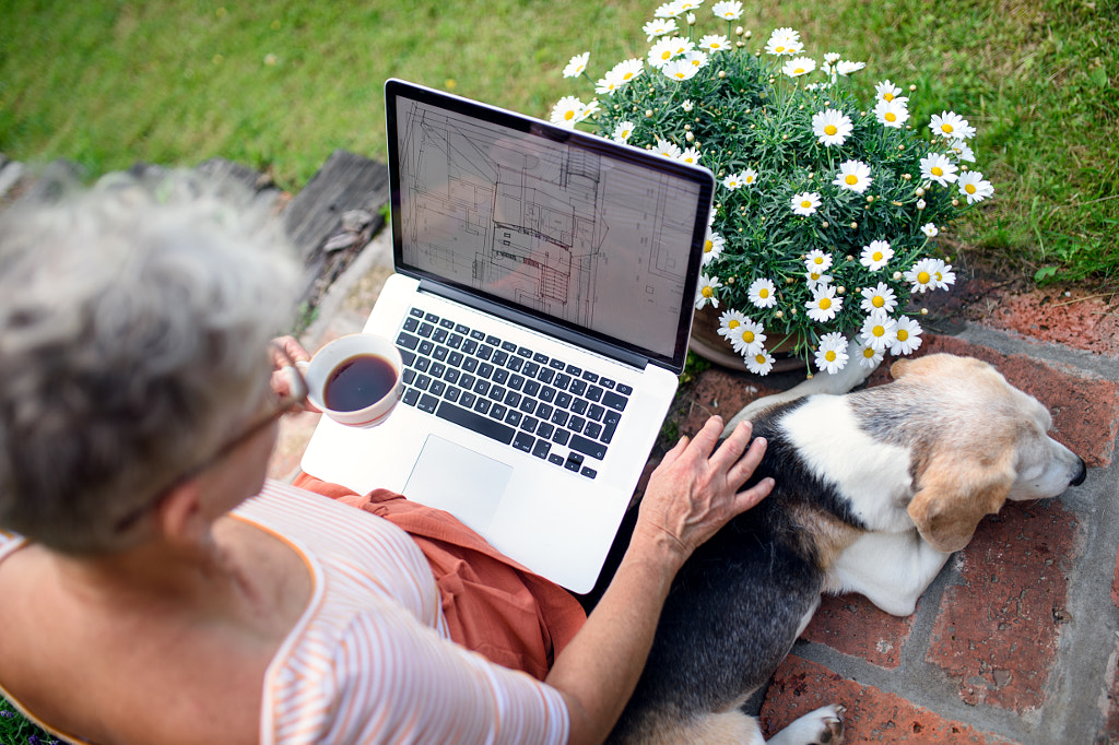 Top view of senior woman architect with laptop working outdoors in by Jozef Polc on 500px.com