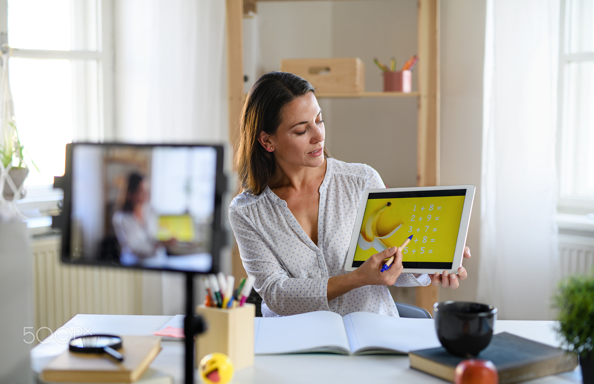 Woman teacher teaching online, coronavirus and online distance