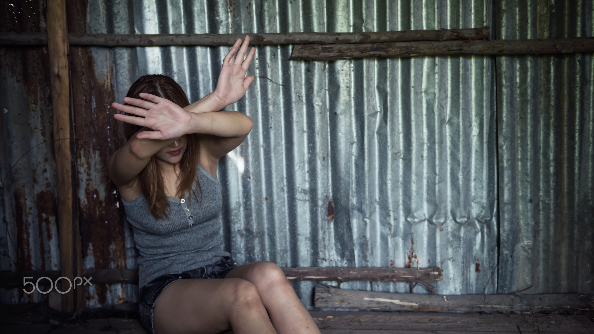 Stop sexual harassment hand gesture by victim woman