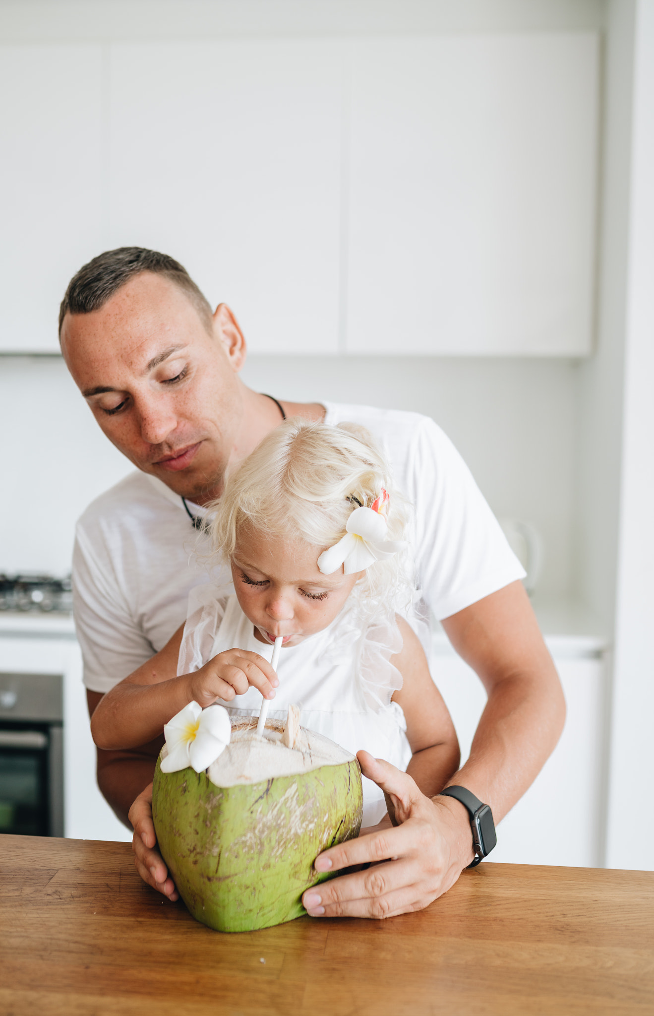 A father with his daughter having breakfast