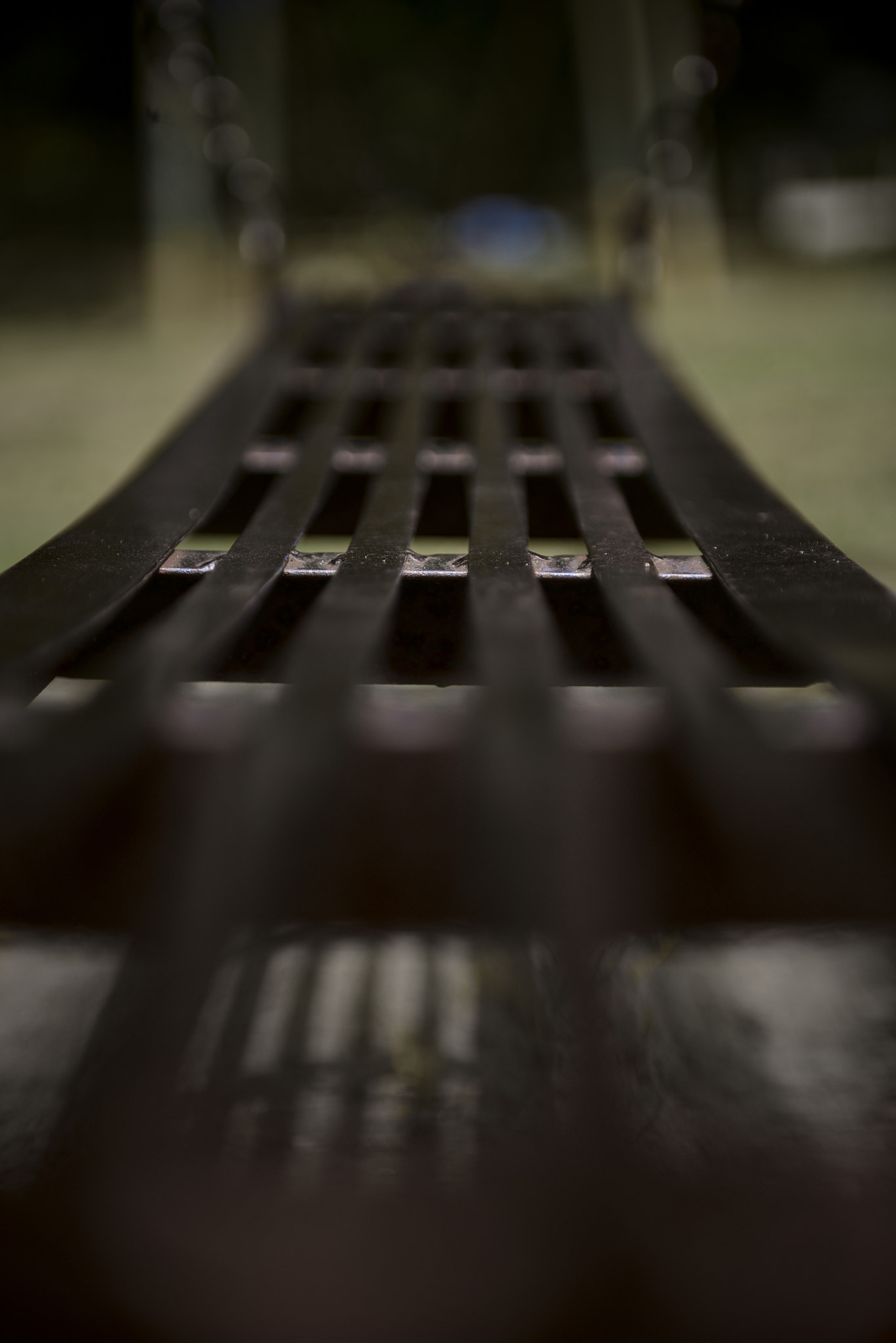 black rusty metal park bench