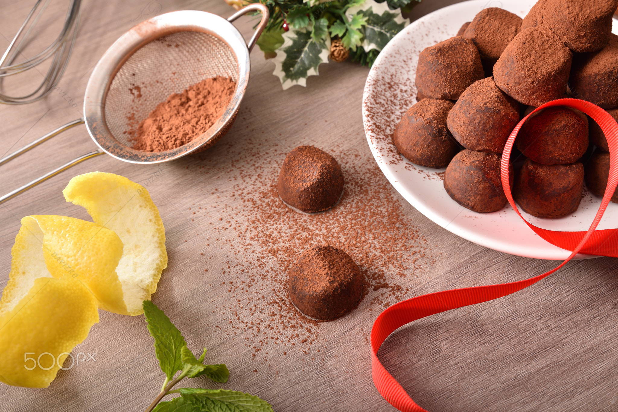 Chocolate truffles with cocoa powder and ingredients event elevated