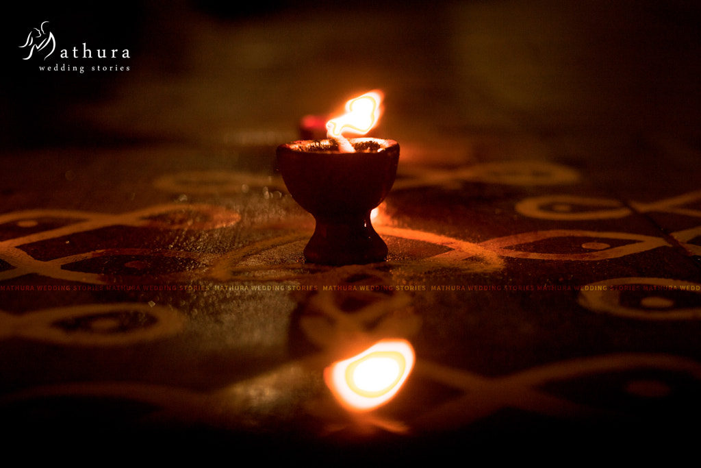 Karthigai Deepam With Traditional Rice Flour Kolam by Mathura Wedding
