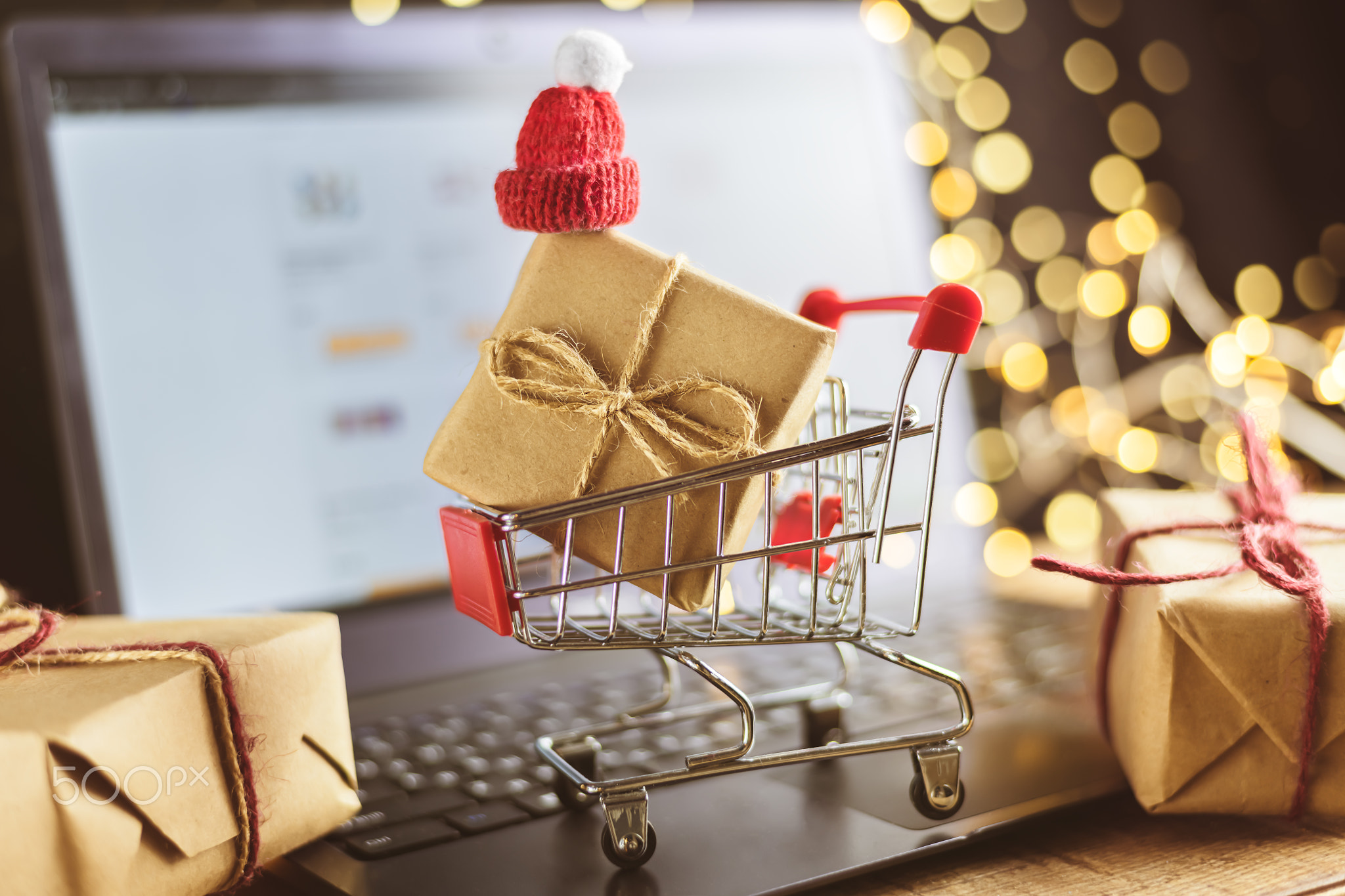 concept of online shopping. new year, christmas, trolley, gifts