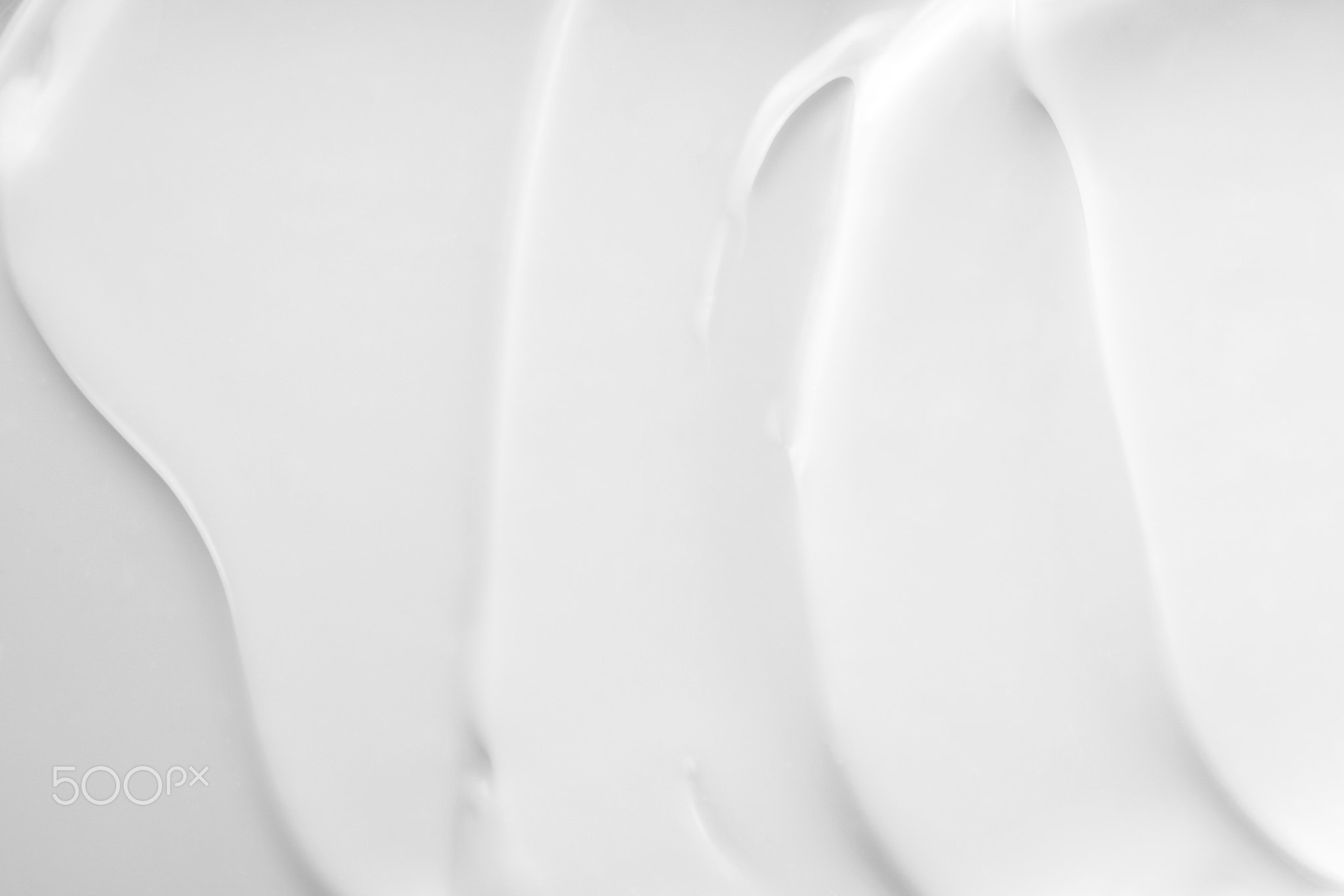 Creamy skincare lotion mousse product closeup.