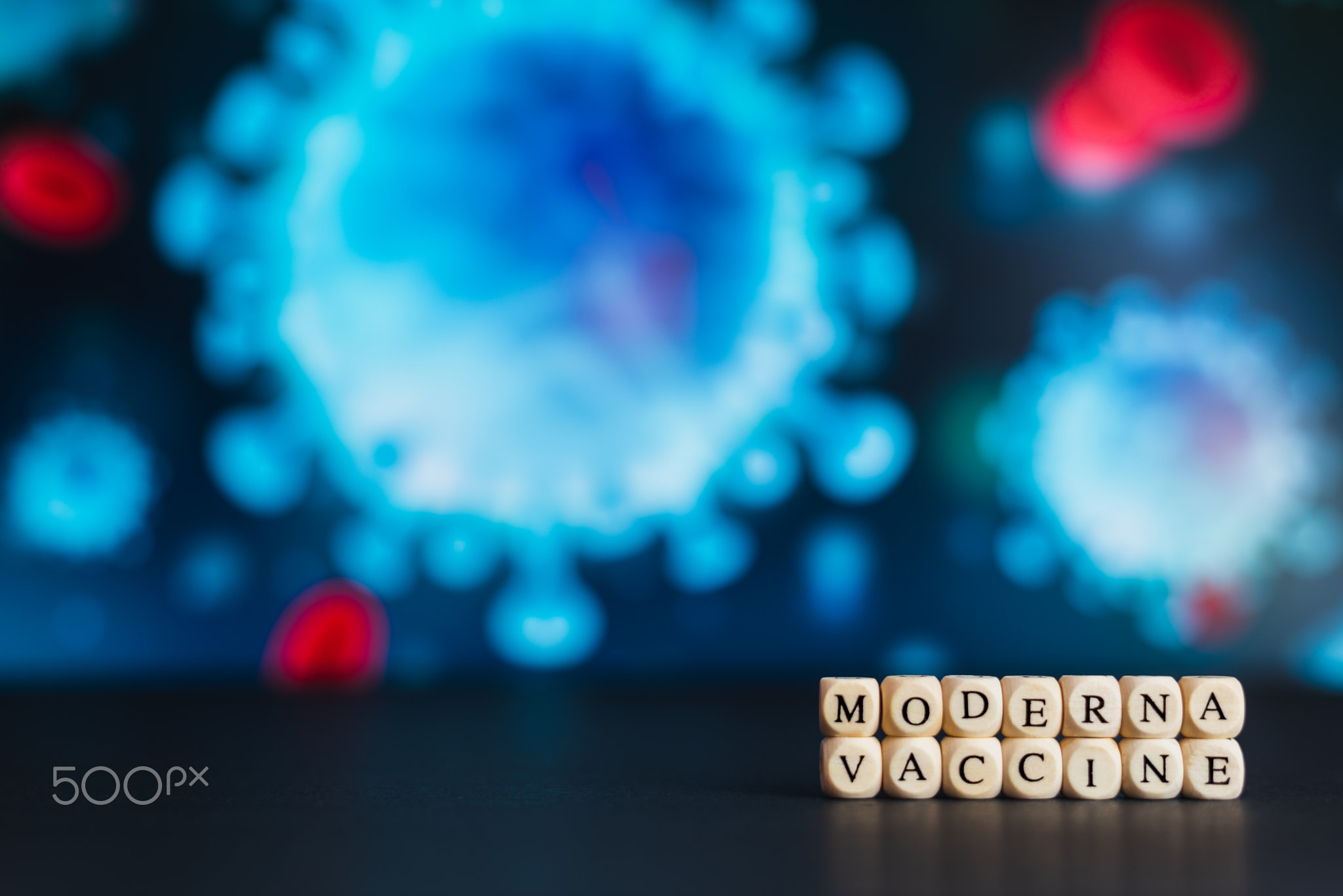 The name of pharmaceutical company moderna written with wooden letters