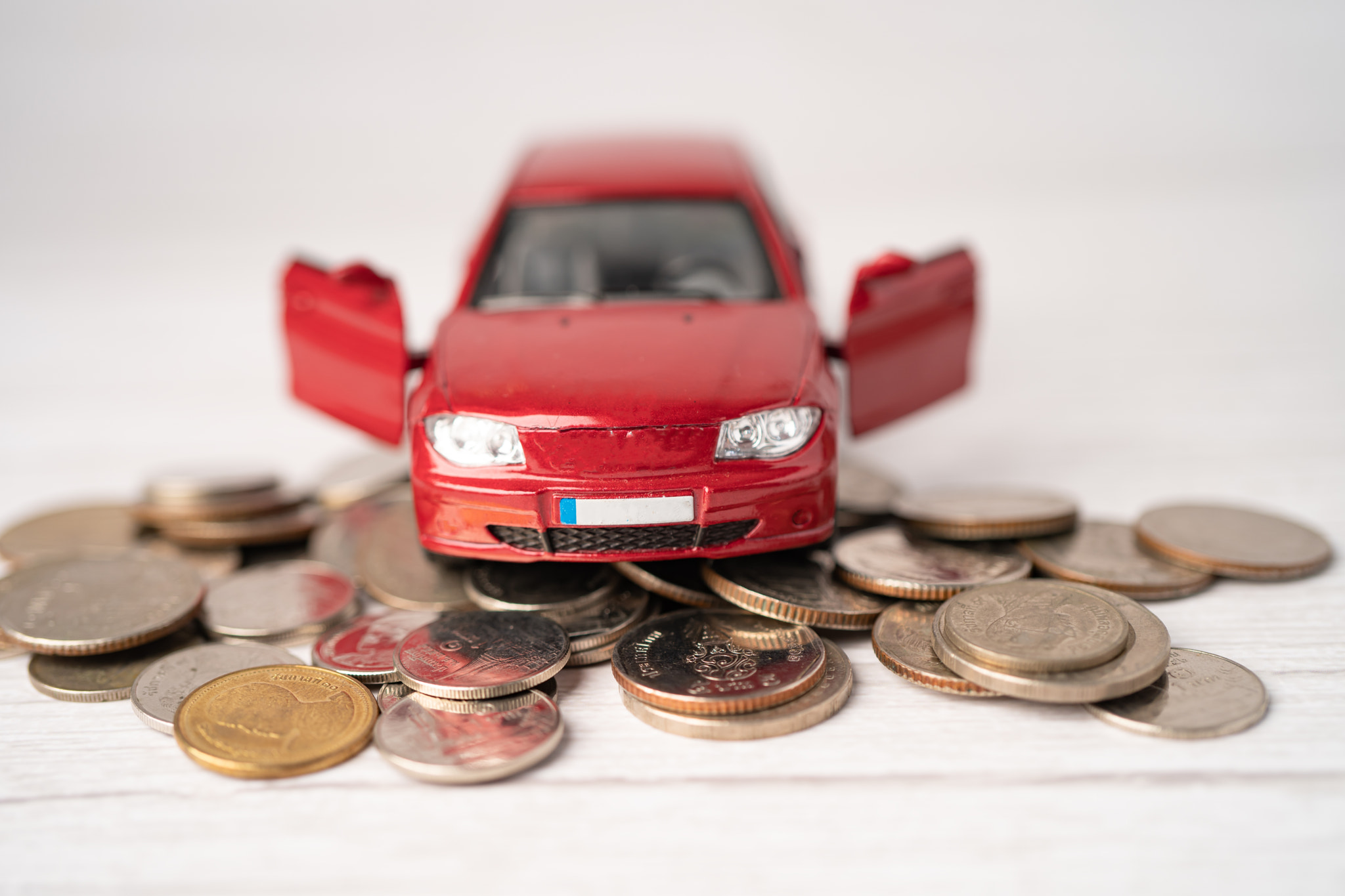 Car on coins background