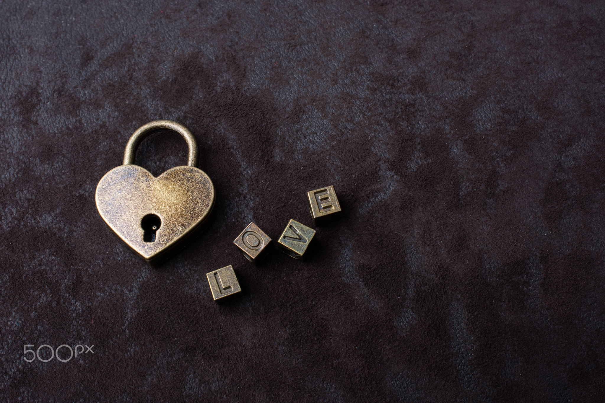 Love shaped padlock, key and love wording