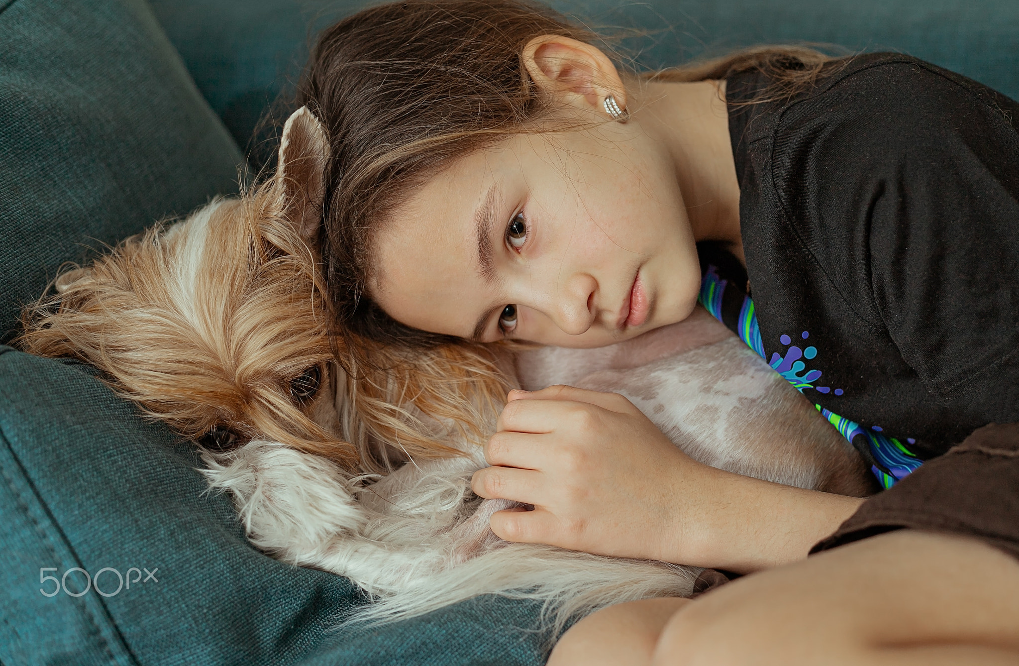 Beautiful girl hugging her dog. Best friends. Toning