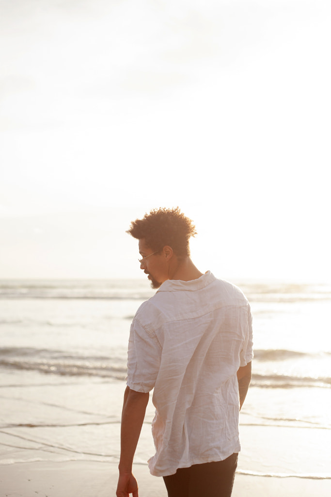 Portrait of young biracial man from behind by Anna Neubauer on 500px.com