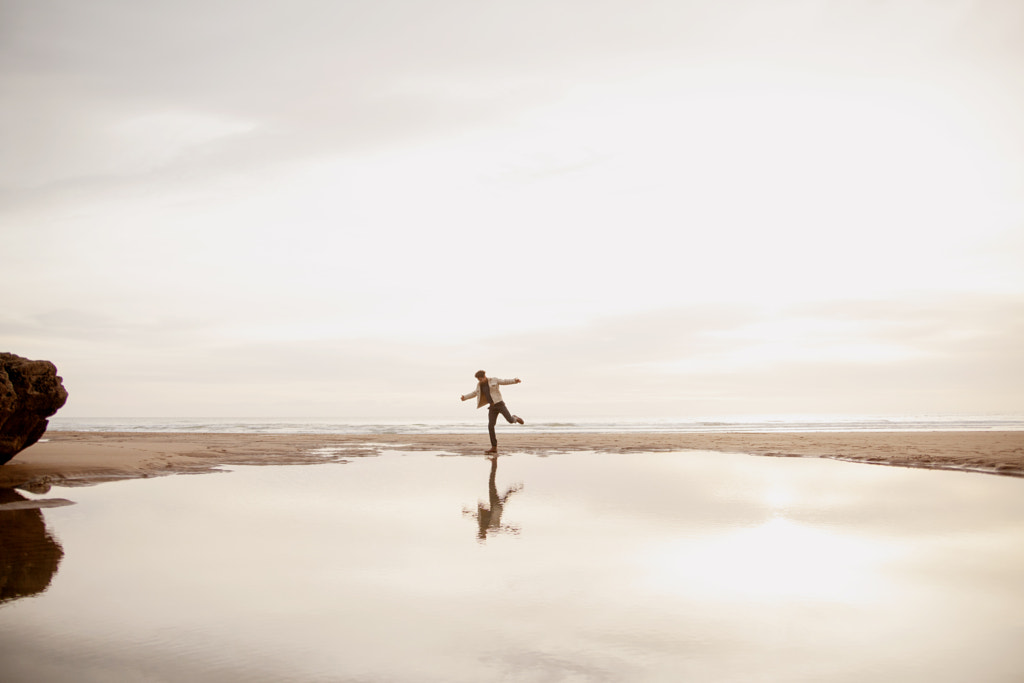 Young biracial dancing and looking at his reflection by Anna Neubauer on 500px.com