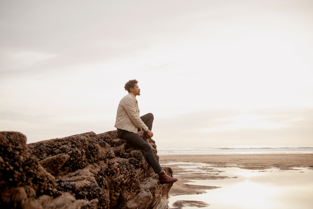 Portrait of young biracial man at the beach by Anna Neubauer on 500px.com