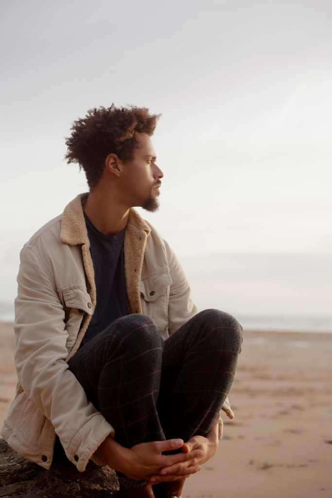 Portrait of young biracial man at the beach by Anna Neubauer on 500px.com