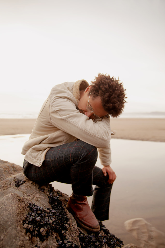 Portrait of young biracial man at the beach by Anna Neubauer on 500px.com